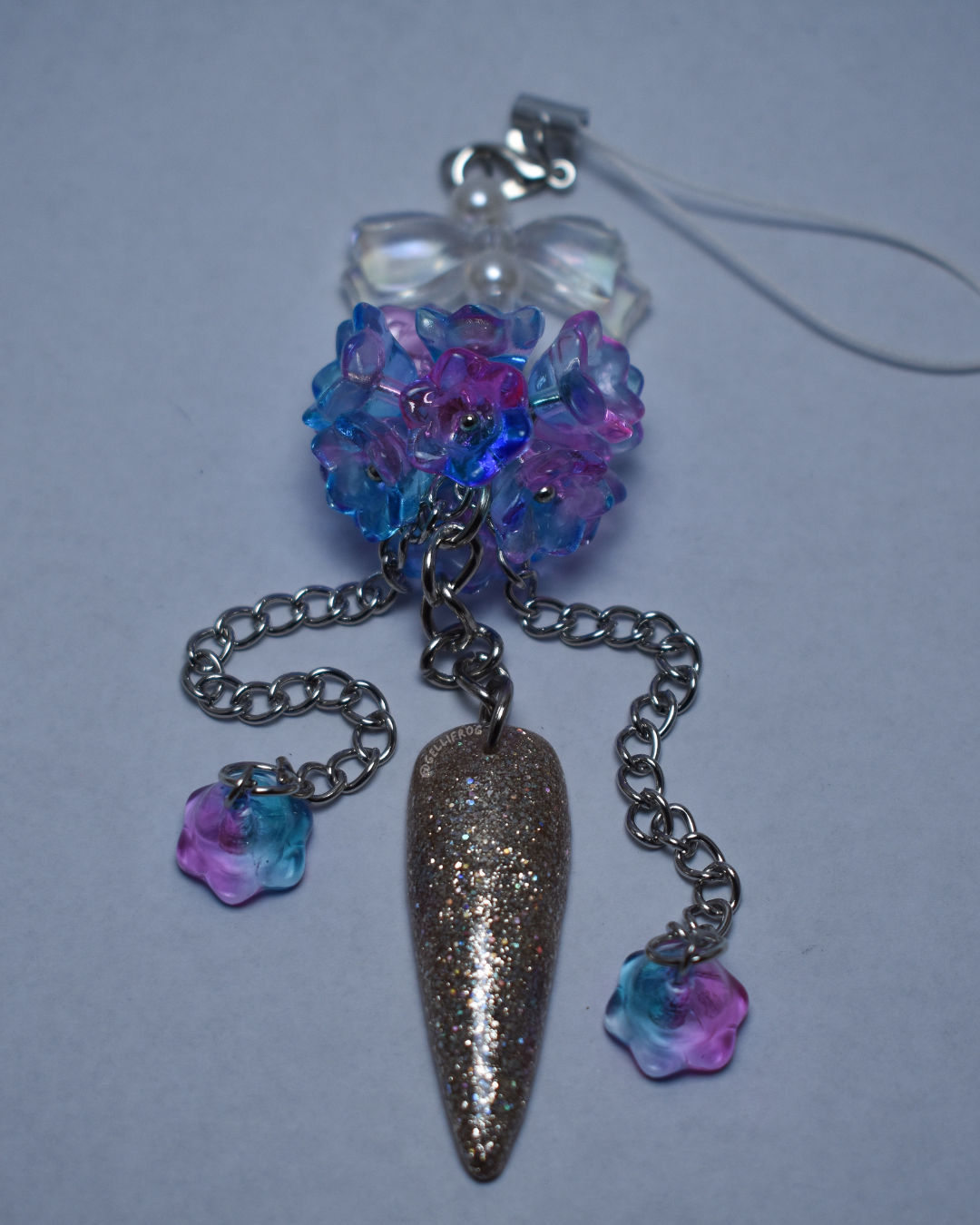 Charming Bag/Phone Charm by Gellifrog with hand-painted holographic nail and NFC