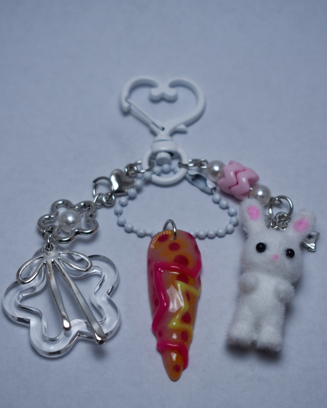 2005 hand-painted vibrant pink and yellow blooming gel nail keychain by Gellifrog with NFC