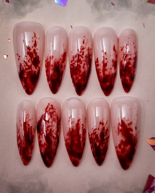 Bleed Out medium stiletto press-on nails by Gellifrog – handmade gel set with blood splatters