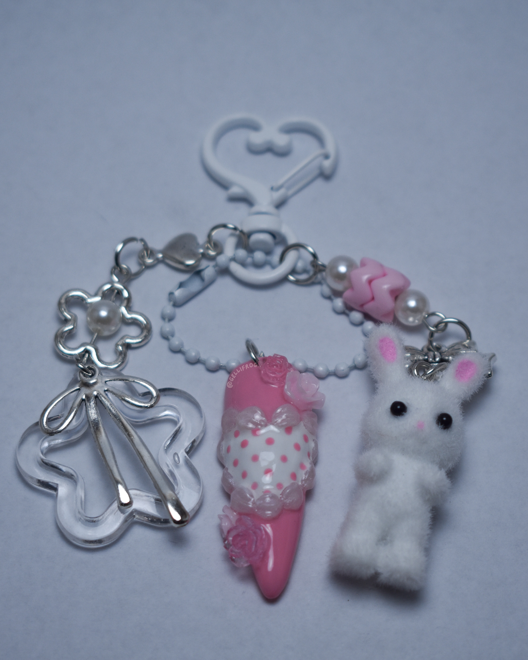 Baby Cakes hand-painted 3D frosted pink and white cake nail keychain by Gellifrog with NFC