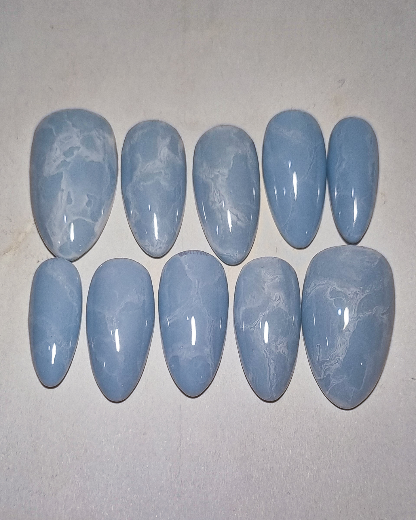 Blue Marble medium almond pale blue press-on nails by Gellifrog – handmade gel set