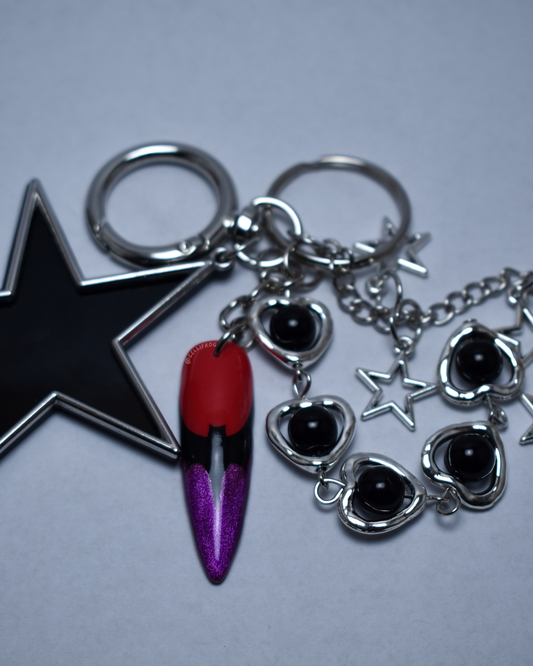 Vamp hand-painted purple and red cat eye bat nail keychain by Gellifrog with NFC