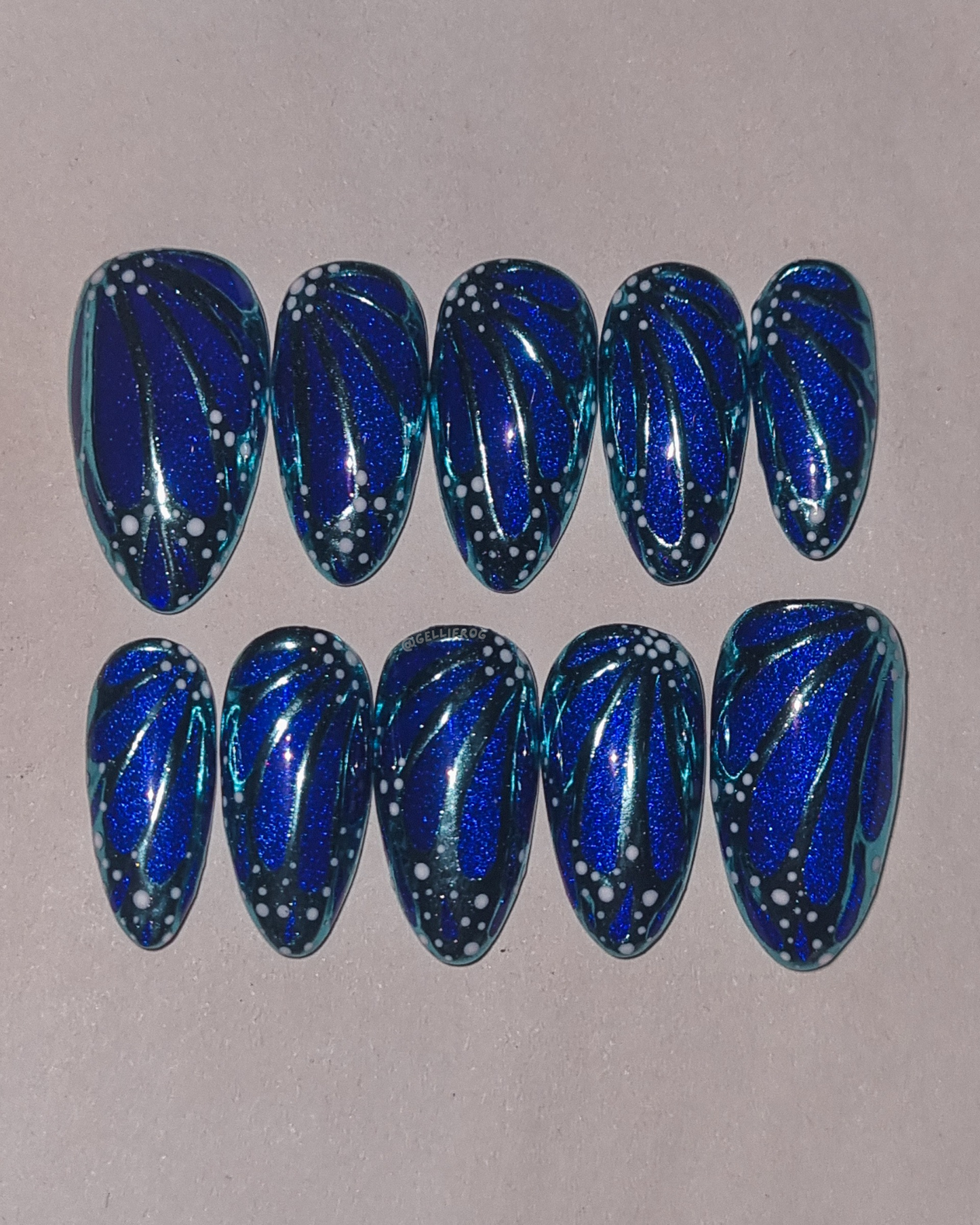 Electric Butterfly medium almond press-on nails by Gellifrog – handmade gel set