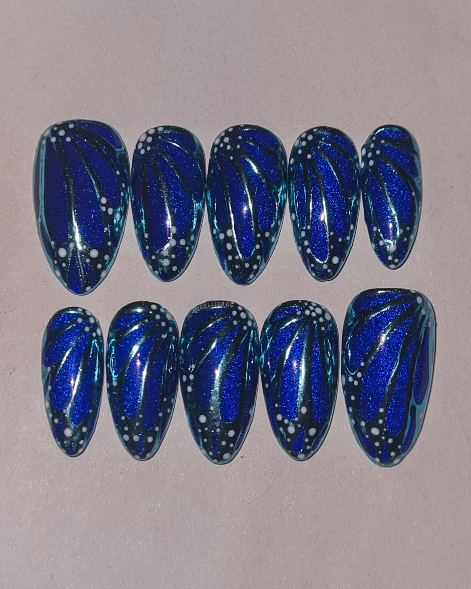 Electric Butterfly medium almond press-on nails by Gellifrog – handmade gel set